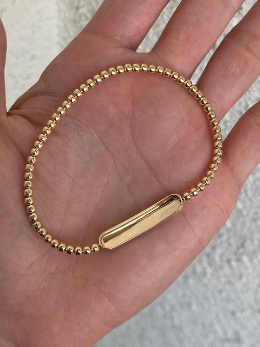 14k stretchy bead bracelet with diamond ID center