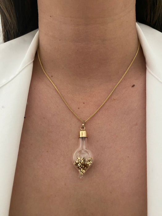 14k glass bottle with moving silver pieces inside charm pendant