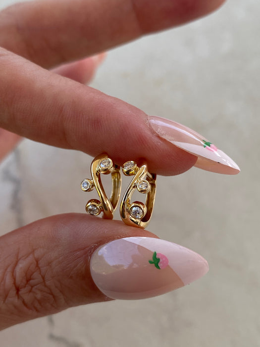 14K Natural Diamond Wavy Huggie Earrings