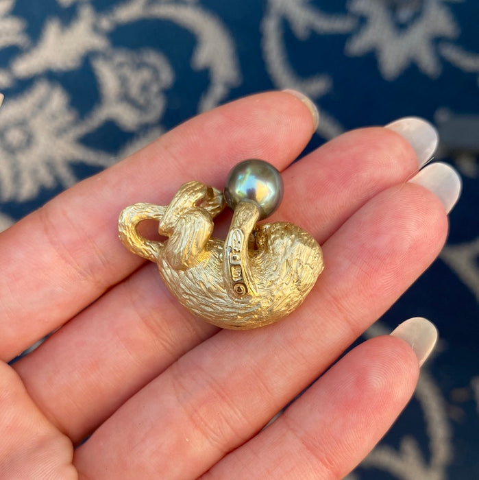 14k otter with diamond eyes and pearl charm