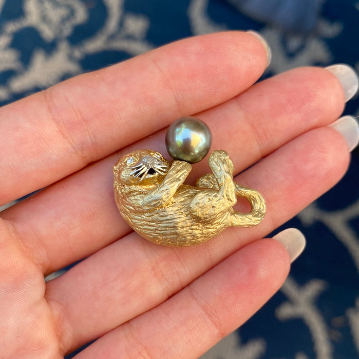 14k otter with diamond eyes and pearl charm