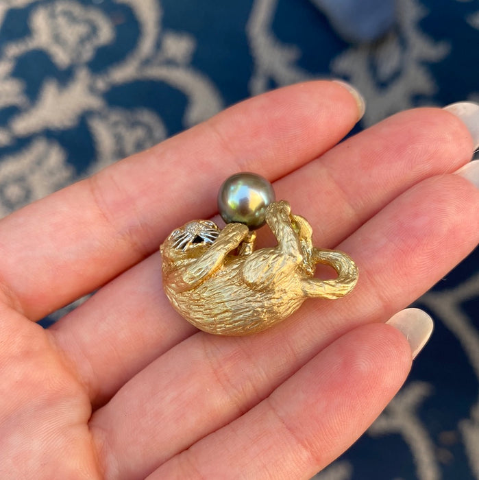 14k otter with diamond eyes and pearl charm