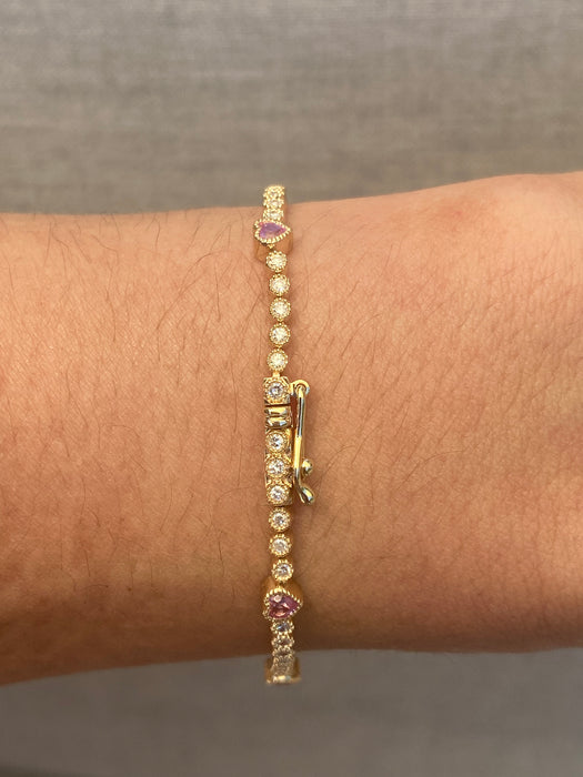 Custom made 14k diamond tennis bezel pink sapphire bracelet