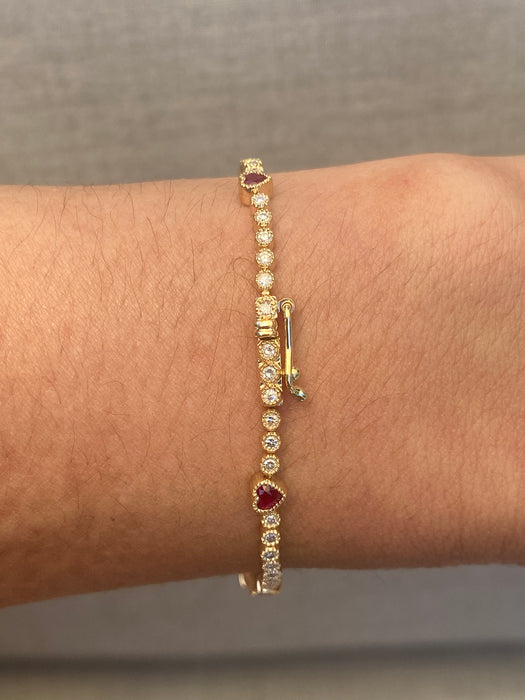 Custom made 14k diamond tennis and bezel ruby heart bracelet